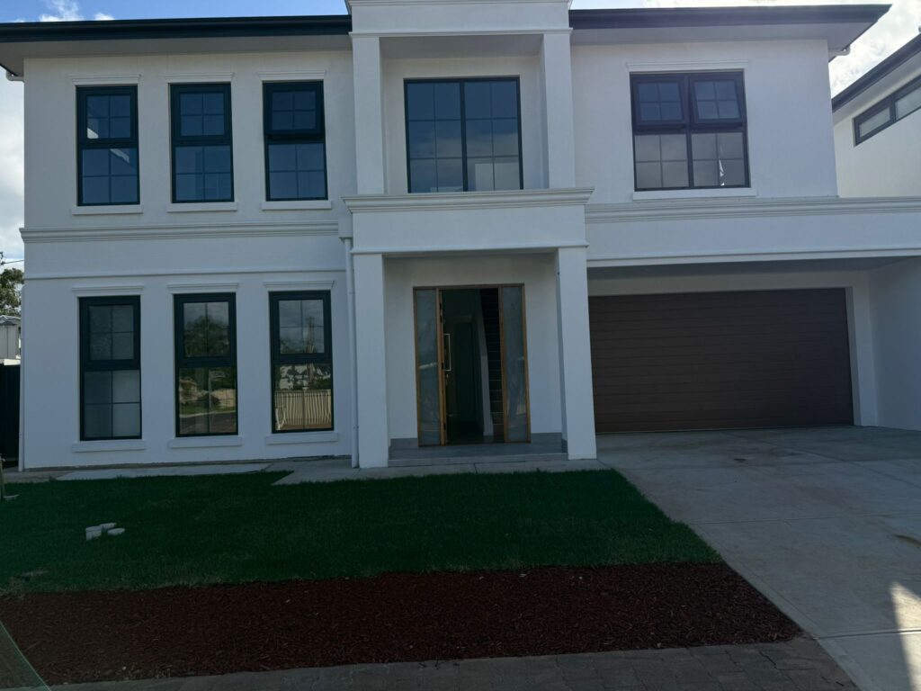 Main bathroom floor and wall porcelain slab tiles completed by First Quality Tiling Tilers Adelaide SA