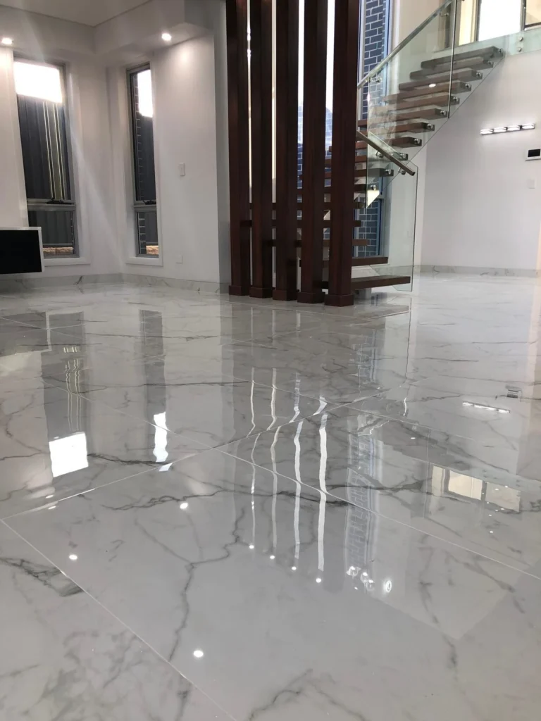 Polished marble-look floor tiling completed in Adelaide by First Quality Tiling