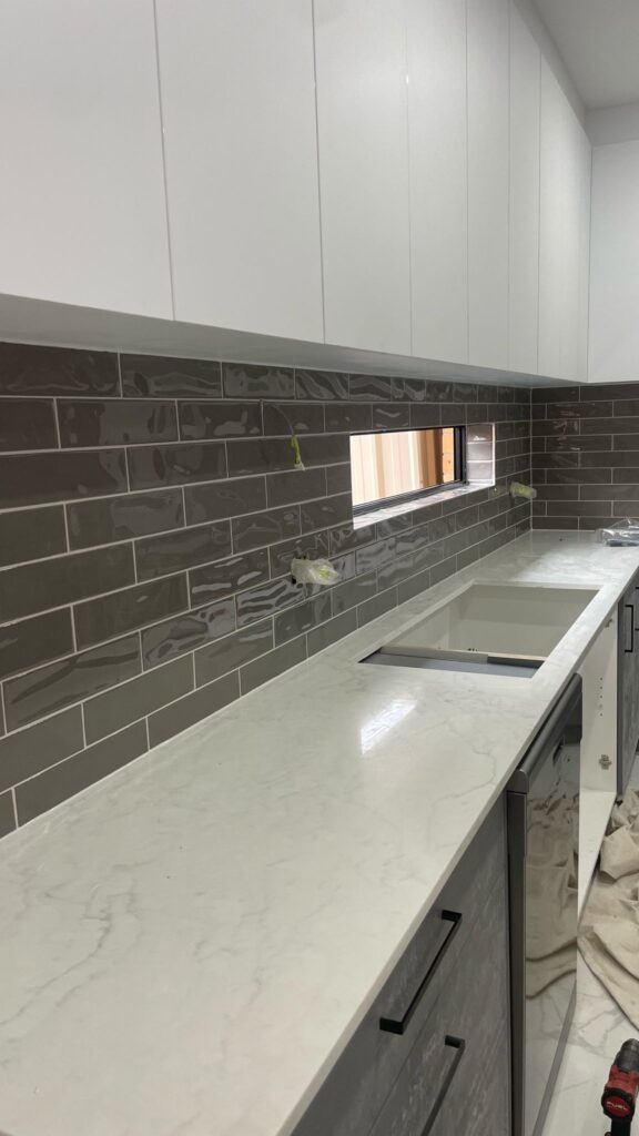 Modern kitchen splashback tiling completed in Adelaide by First Quality Tiling