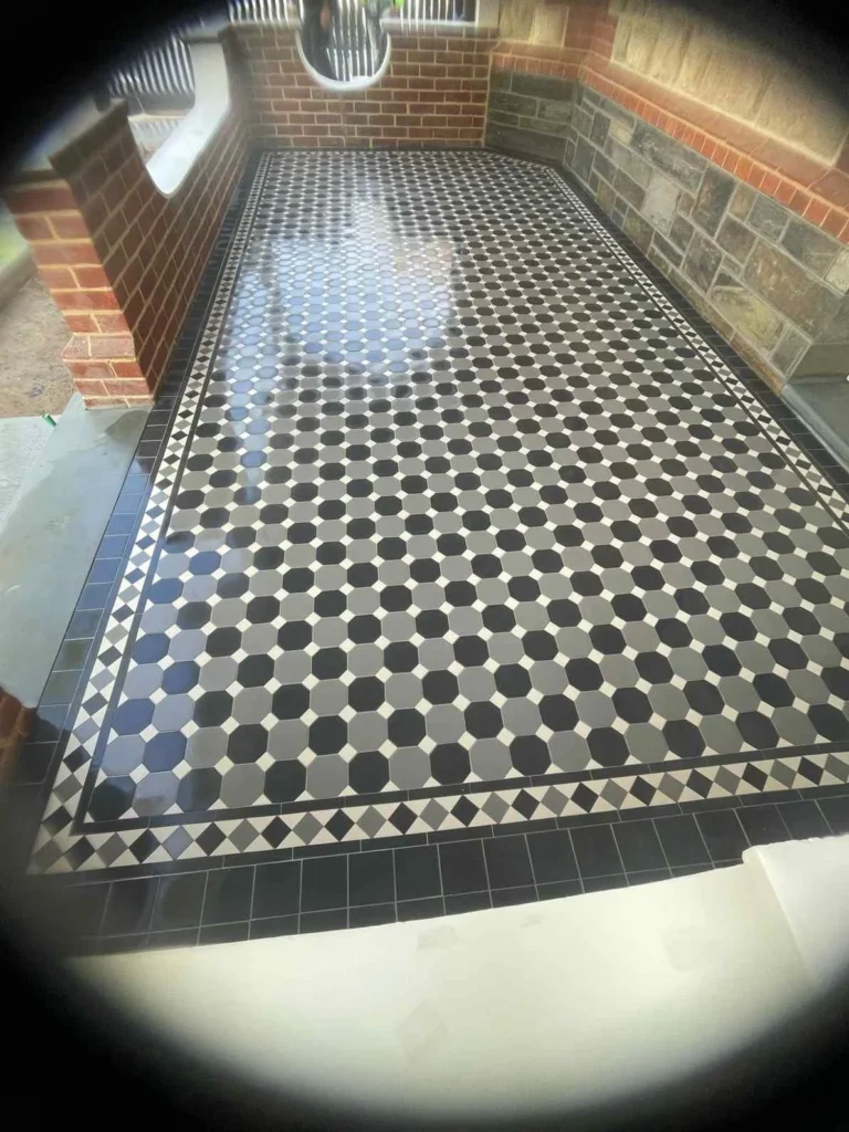 Decorative verandah floor tiling installed in Adelaide by First Quality Tiling
